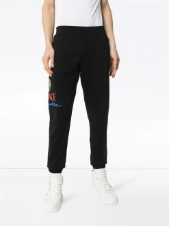 Versace pantalon de jogging à logo imprimé