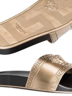 Versace claquettes embossées Medusa