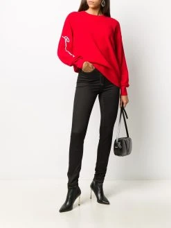 Versace jean skinny à fleurs brodées