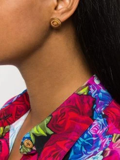 Versace boucles d'oreilles Medusa à design rond