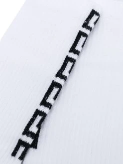 Versace chaussettes nervurées à motif monogrammé