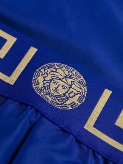 Versace short de bain à bande Greca