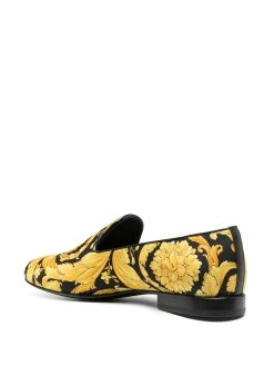 Versace slippers à imprimé Barocco