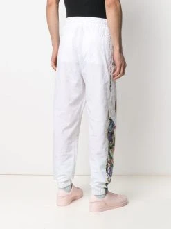 Versace pantalon de jogging à imprimé graphique