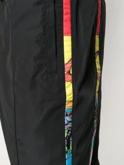 Versace pantalon de jogging à imprimé graphique