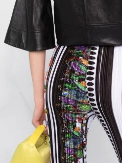 Versace pantalon évasé à imprimé graphique