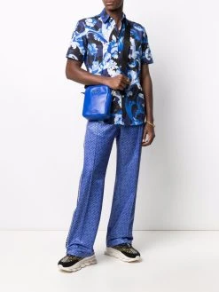 Versace pantalon de jogging à logo imprimé