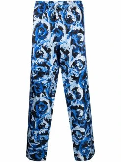 Versace pantalon en soie à imprimé baroque