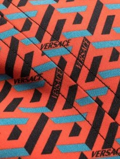 Versace robe courte à logo Greca imprimé