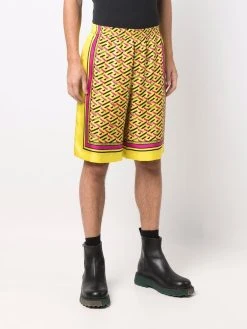 Versace short en soie à imprimé géométrique
