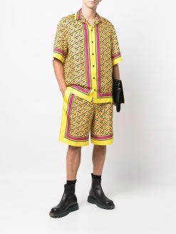 Versace short en soie à imprimé géométrique