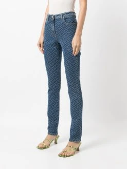 Versace jean skinny à imprimé Greca