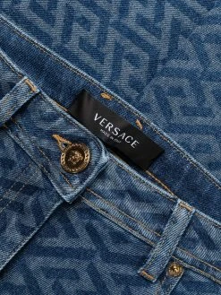 Versace jean skinny à imprimé Greca