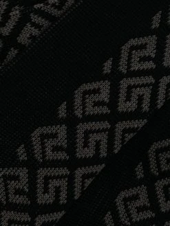 Versace chaussettes en maille à imprimé Greca