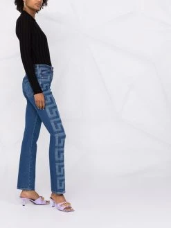 Versace jean droit à bandes Greca