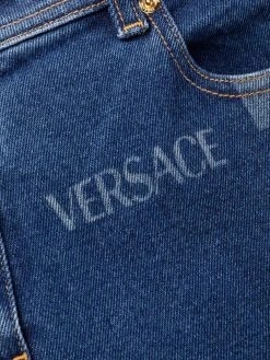 Versace jean droit à bandes Greca