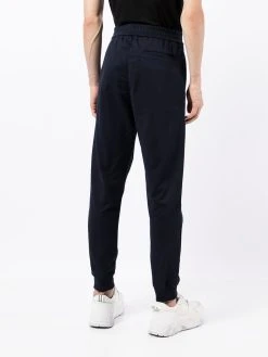 Versace pantalon de jogging à imprimé Greca