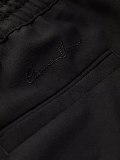 Versace pantalon de jogging à lien de resserrage