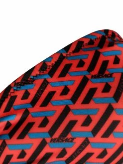 Versace haut de bikini à imprimé Greca Signature