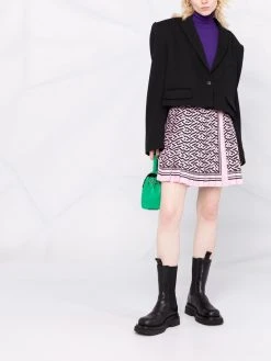 Versace minijupe plissée à imprimé La Greca