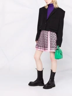 Versace minijupe plissée à imprimé La Greca