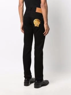 Versace jean droit à motif Medusa brodé