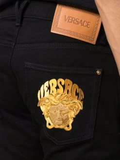 Versace jean droit à motif Medusa brodé