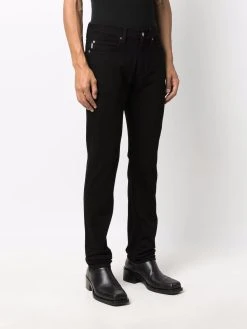 Versace jean droit à motif Medusa brodé