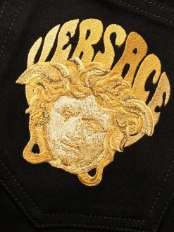 Versace jean droit à motif Medusa brodé